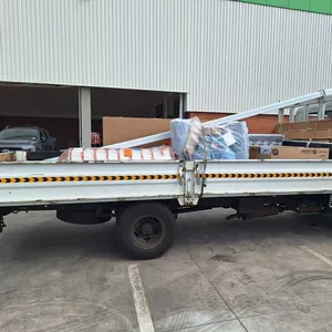 Bakkie driver loading furniture and boxes